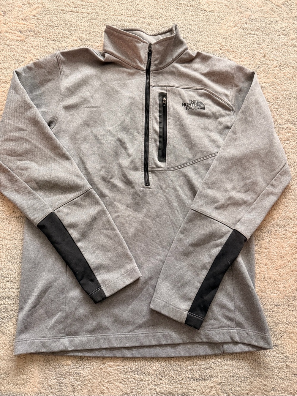 The North Face Men’s Light Gray Zip-Up Fleece with Black Trim